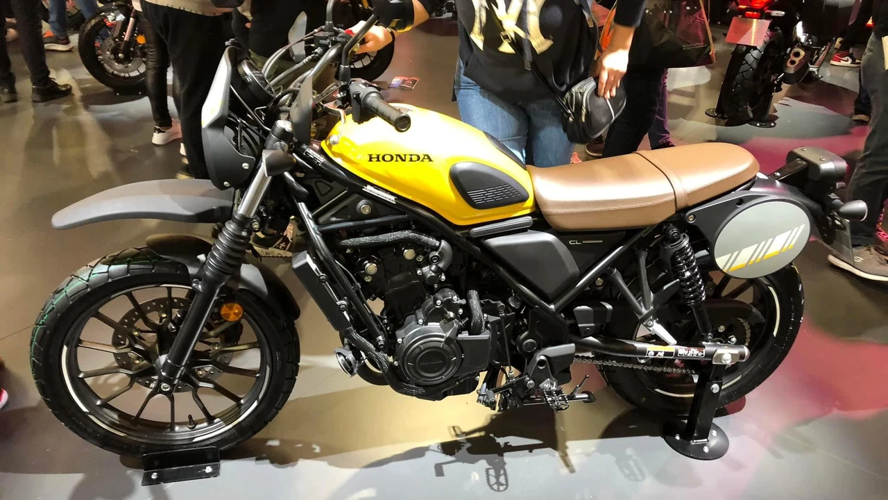 Honda CL500 Candy Energy Yellow Scrambler Motorcycle Exhibition Profile